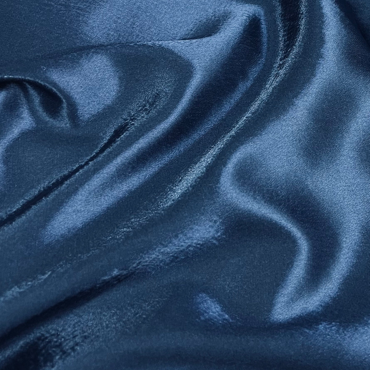 Plain navy crepe back satin fabric