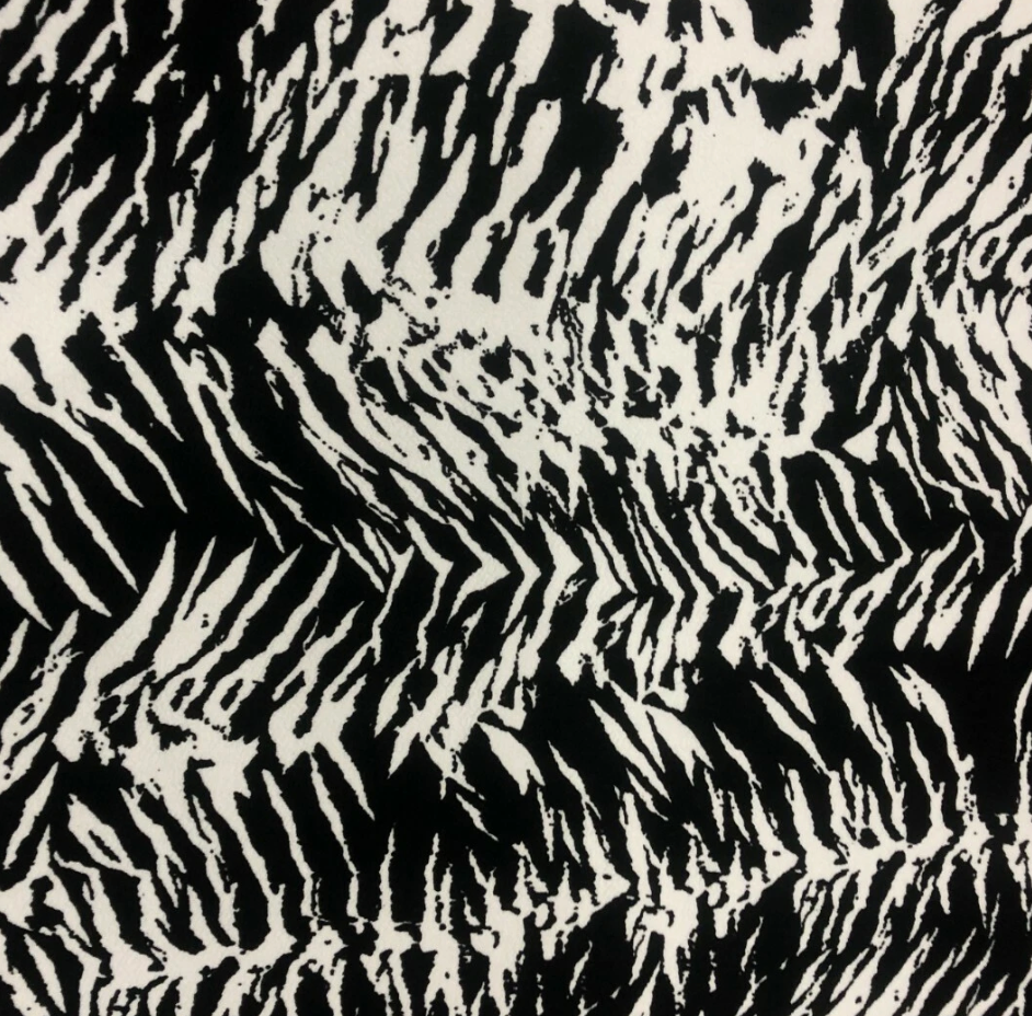 Animal print multi coloured black Liverpool textured scuba jersey stretch fabric