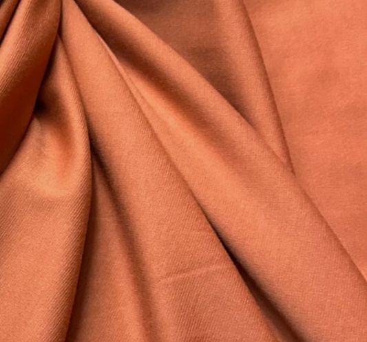 Plain rust Ponte Roma double jersey fabric