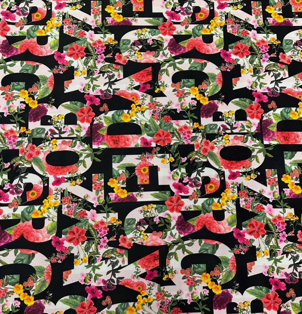 Letters print multi coloured Liverpool textured scuba jersey stretch fabric